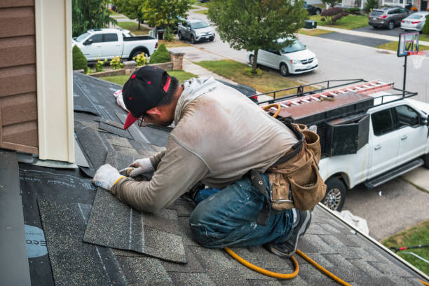 Professional Roofing technician working in Helmetta, NJ